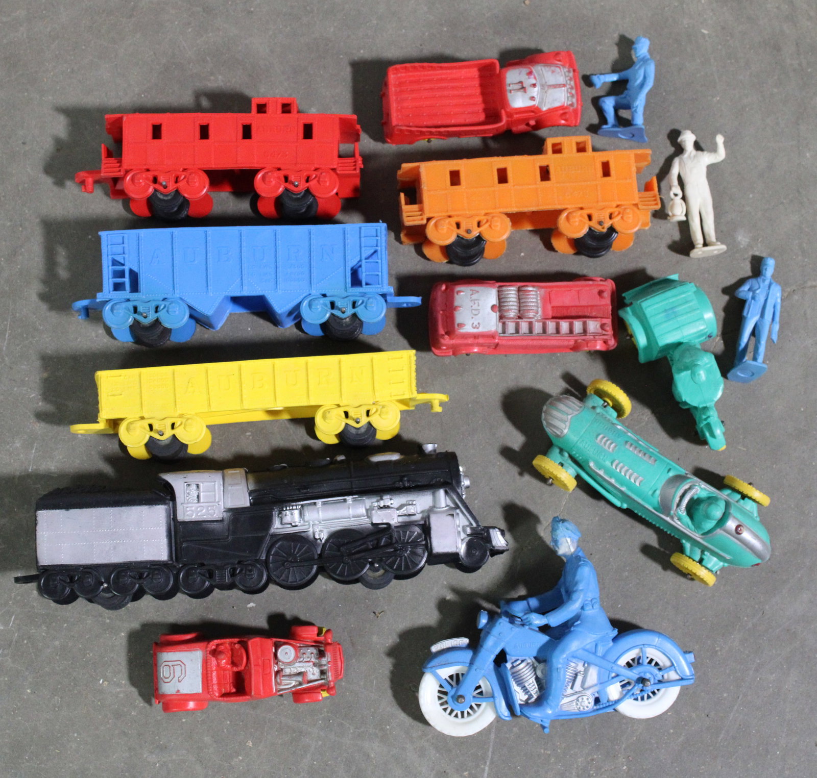 Auburn Rubber Toys incl. Race Car, Fire Engine, Police Motorcycles and Train: In-house shipping available.