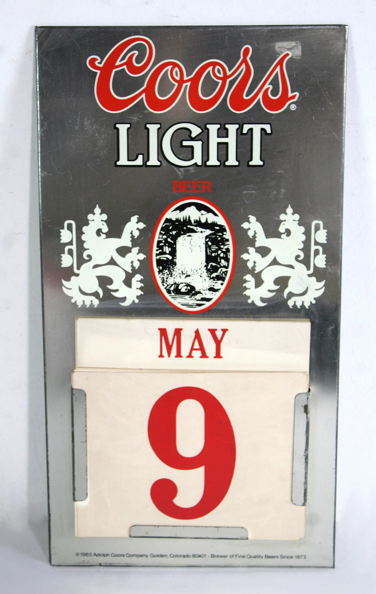 Coors Beer Calendar Sign, 1985: Dates not checked for completeness, Three months. Dates not checked for completeness, Three months. In-house shipping available. Dimensions: 17 x 9 x 1