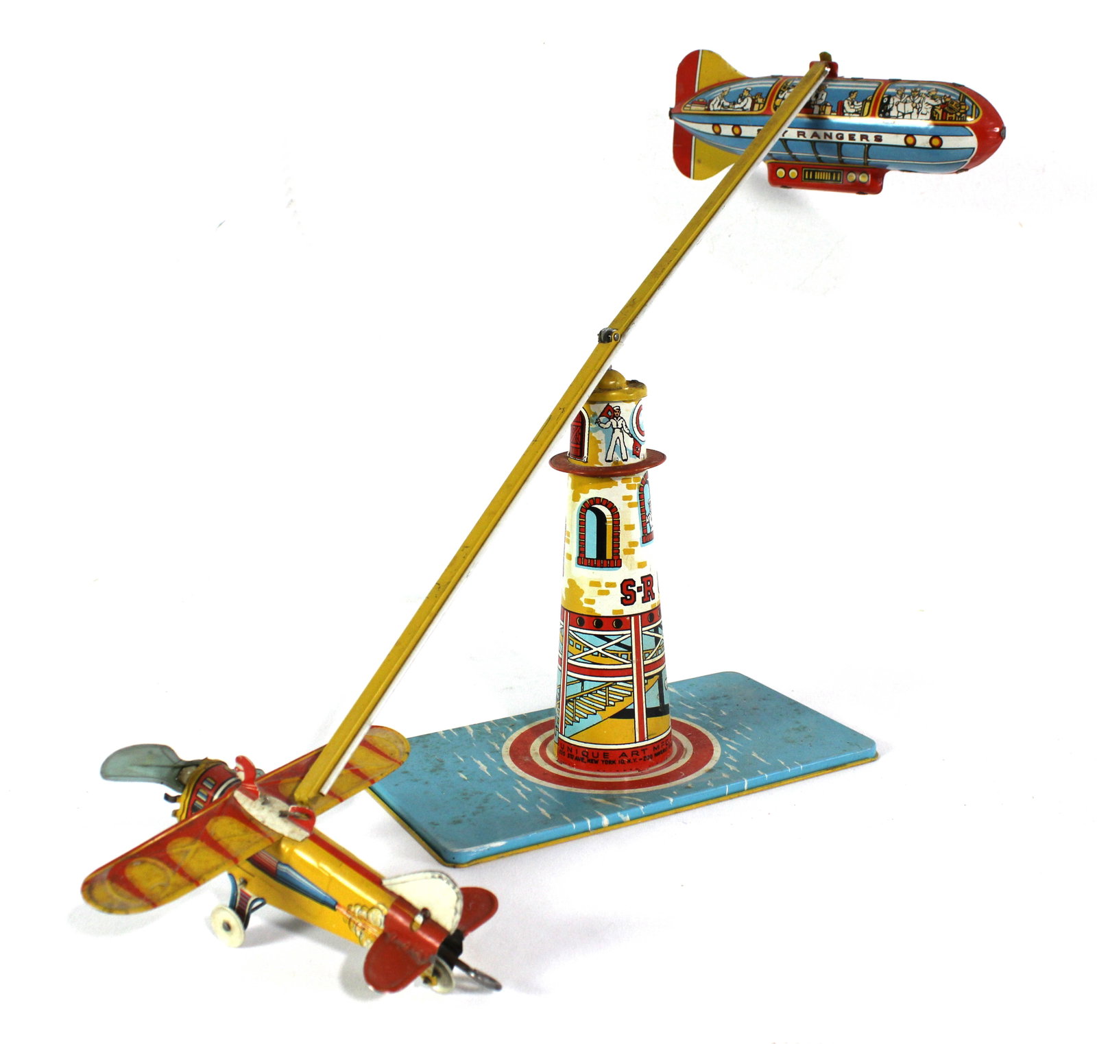 Unique Art Sky Rangers Tin Toy, 1930s: This item requires third-party shipping or pickup arrangements to be made. Dimensions: 10 x 28 x 11