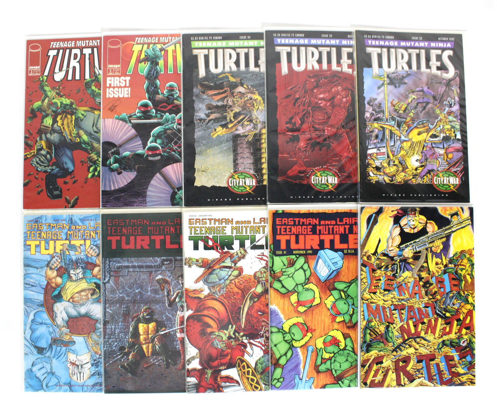 Teenage Mutant Ninja Turtles Comic Books: Total of 10. Bagged and boarded. In-house shipping available.