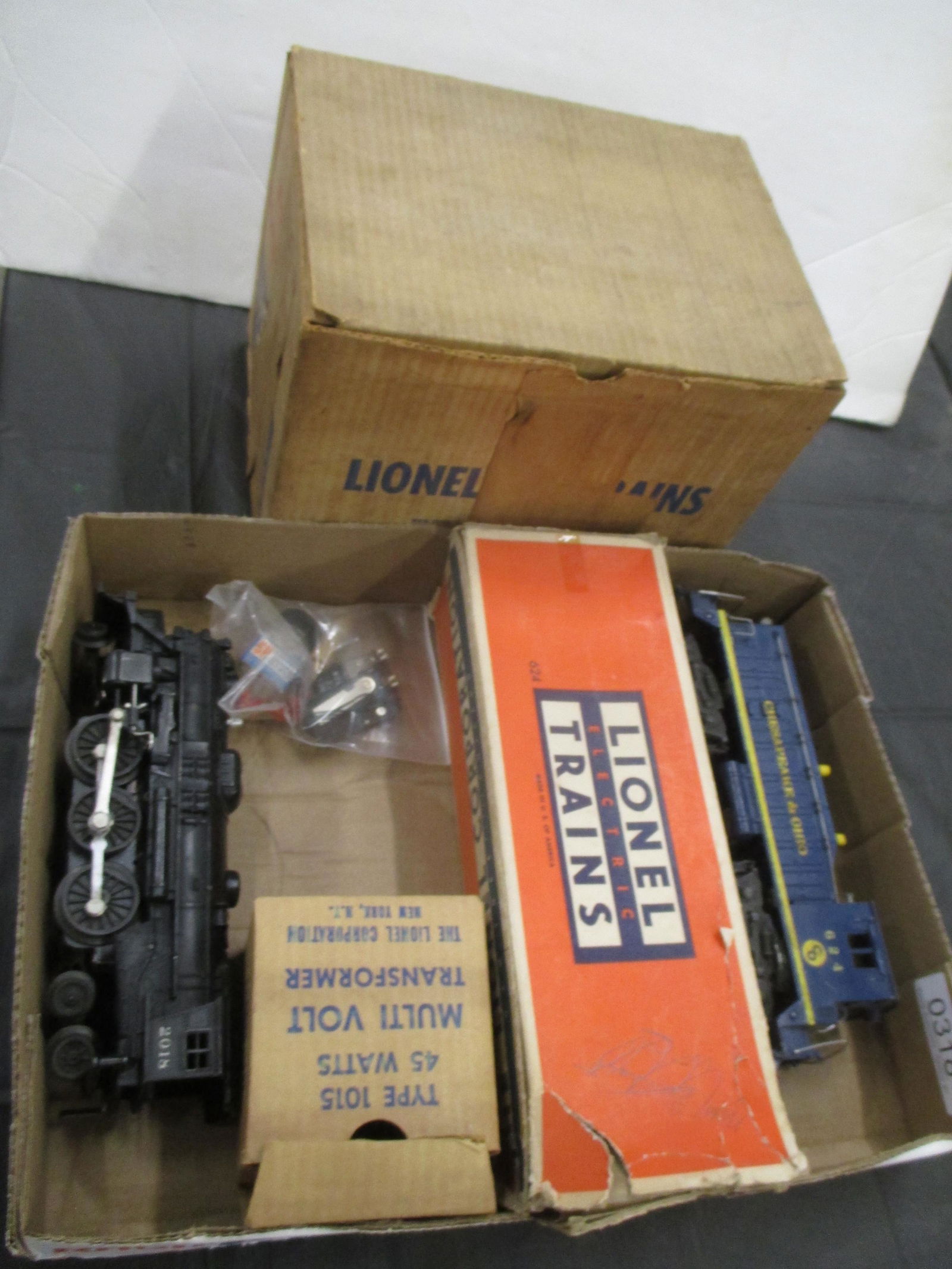 LIONEL ENGINES, TRANSFORMER, & WATERTANK (1 of 2)