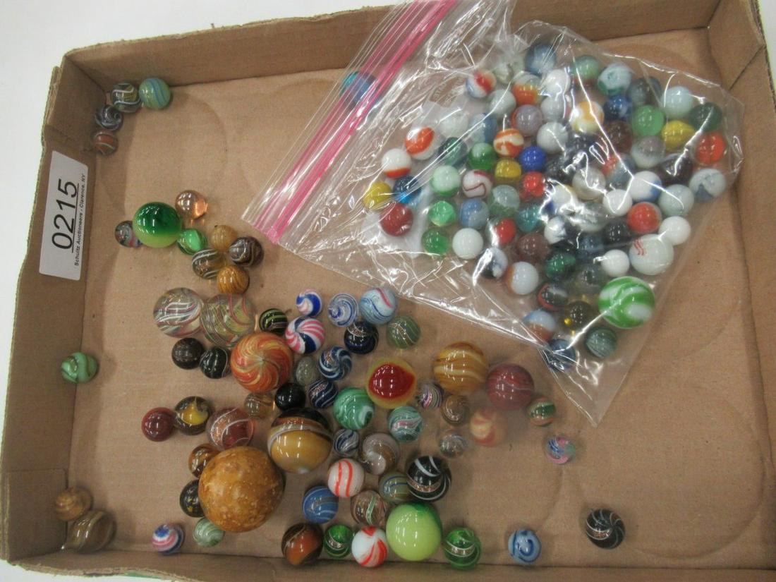 LOT OF MARBLES INCLUDING LARGE SWIRLS: LOT OF MARBLES INCLUDING LARGE SWIRLS AND SHOOTERS