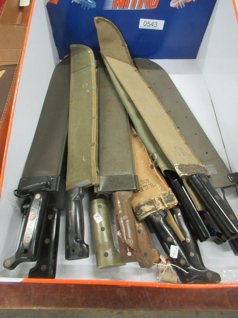 11 VARIOUS MACHETES IN SHEATHS, SOME MILITARY: 11 VARIOUS MACHETES IN SHEATHS, SOME MILITARY