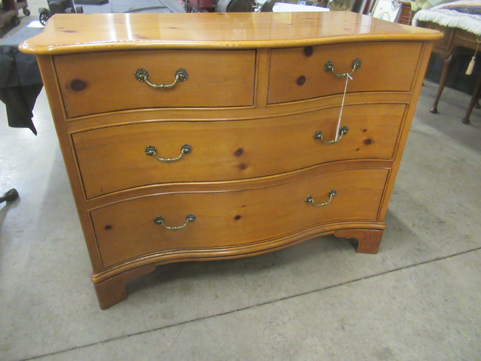 Pine Serpentine Front Chest by Baker Furniture: Knotty Pine Serpentine Front Chest by Baker Furniture, Approx. 36" h x 43" w