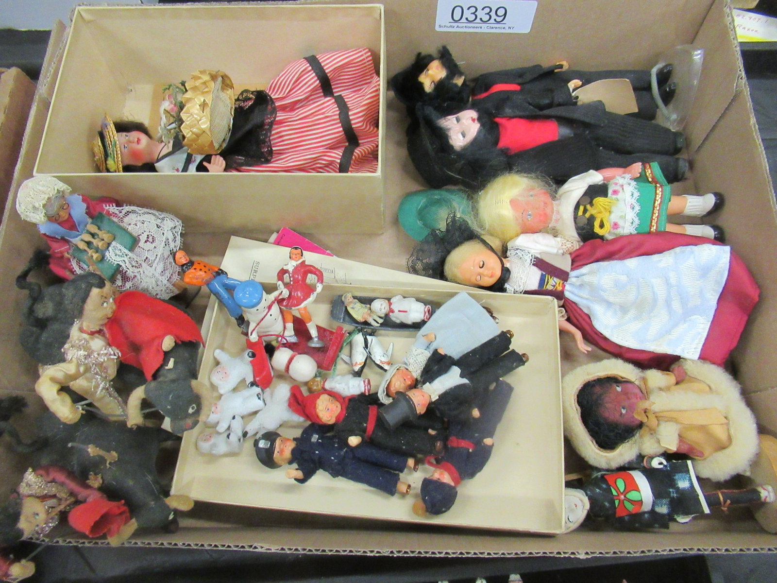 Box Lot of Small Dolls Including Snow Babies, Etc: Box Lot of Small Dolls including Snow Babies, Amish Dolls, Etc.