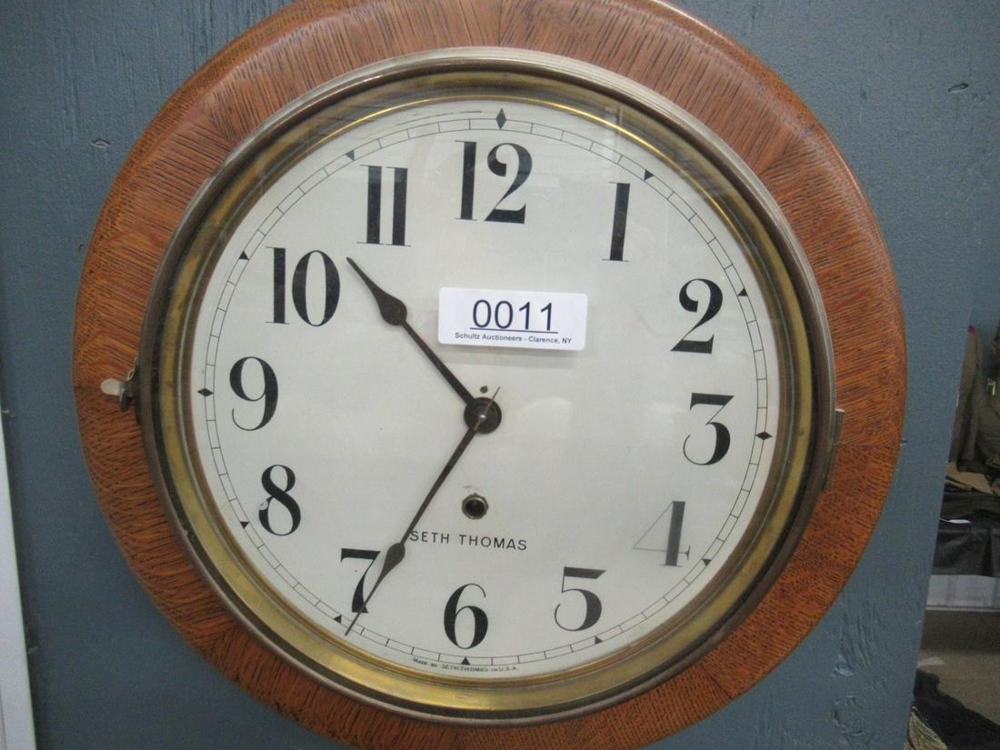 Seth Thomas Clock in Round Oak Case: Seth Thomas Clock in Round Oak Case, Approx. 16" Diam., 3.5" deep