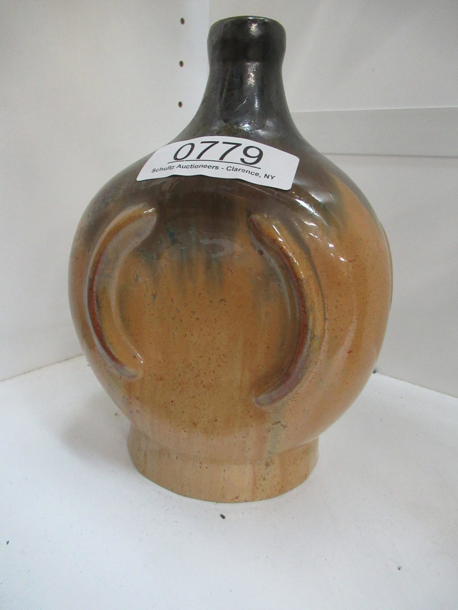 Fulper Pottery Liquor Bottle w/ Music Box Base: Fulper Pottery Liquor Bottle with Music Box Base, Plays "How Dry I AM" - Approx 8.5"h x 6"