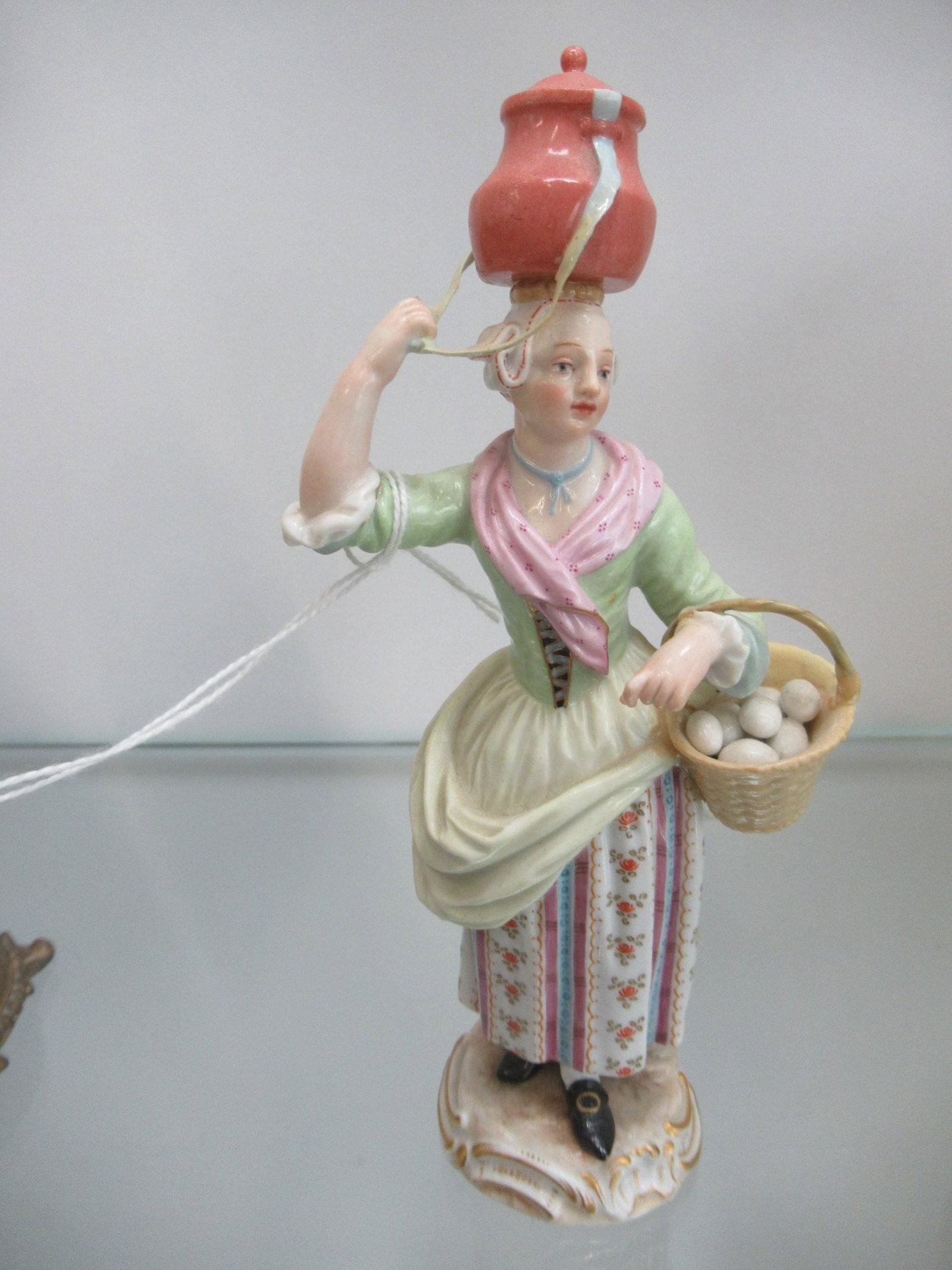 Meissen Woman with Basket of Eggs: Meissen Woman with Basket of Eggs - Approx. 6.5"h x 3"w