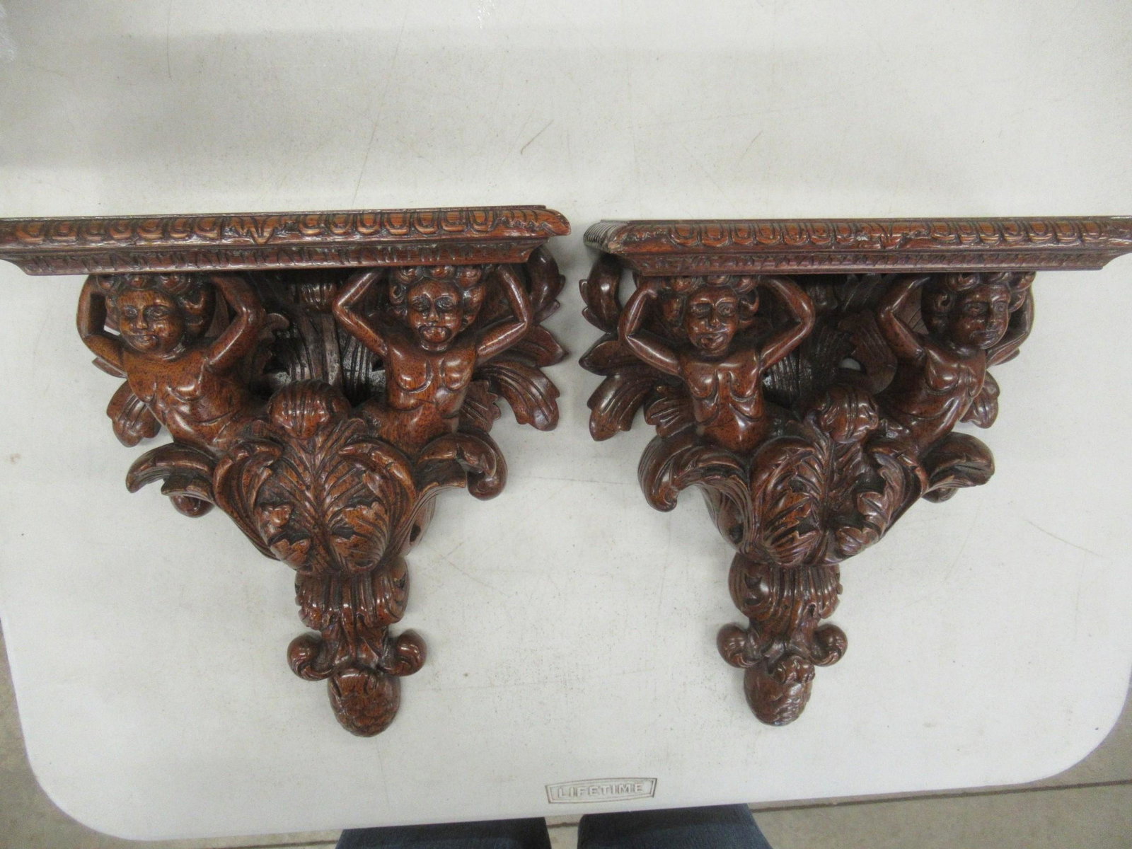 2 Carved Wood Shelves in Mahogany: 2 Carved Wood Shelves in Mahogany with Figures at Top - Approx. 13" t x 11" w