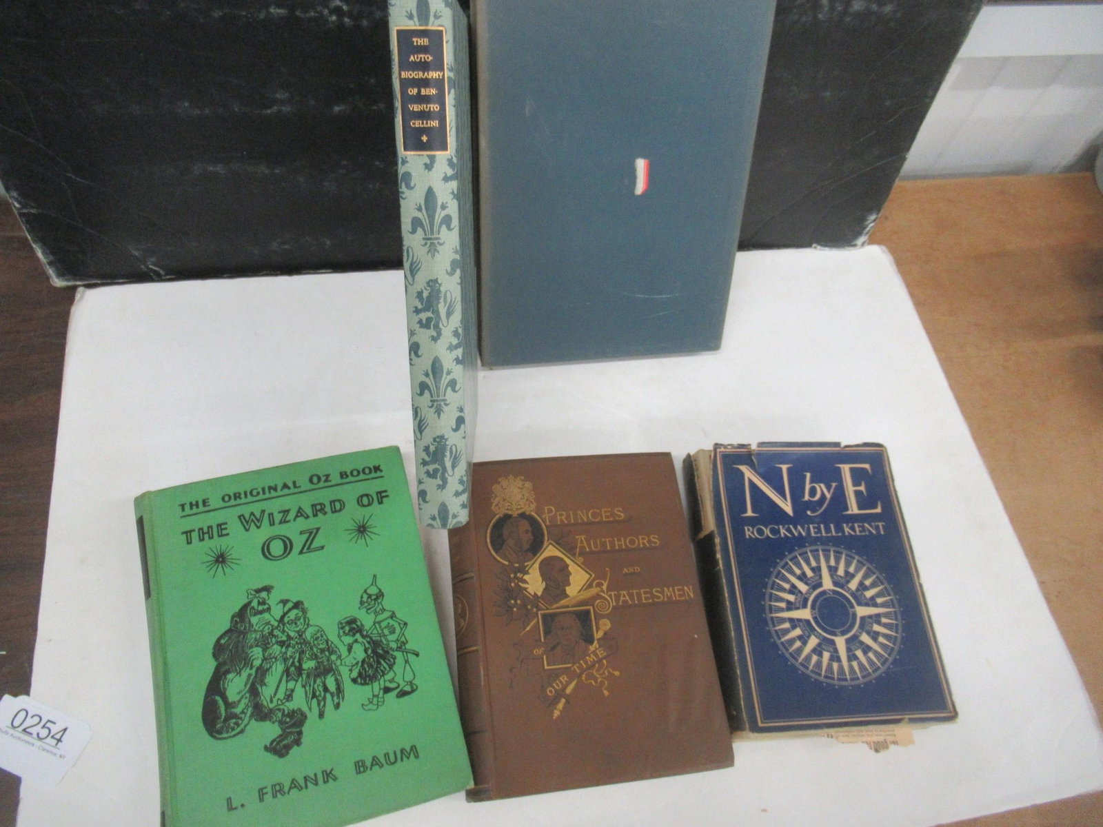 4 Books incl. North by East by Rockwell Kent: 4 Books incl. North by East by Rockwell Kent and signed, Wizard of Oz, Autobiography of Benbunuto Cellini -