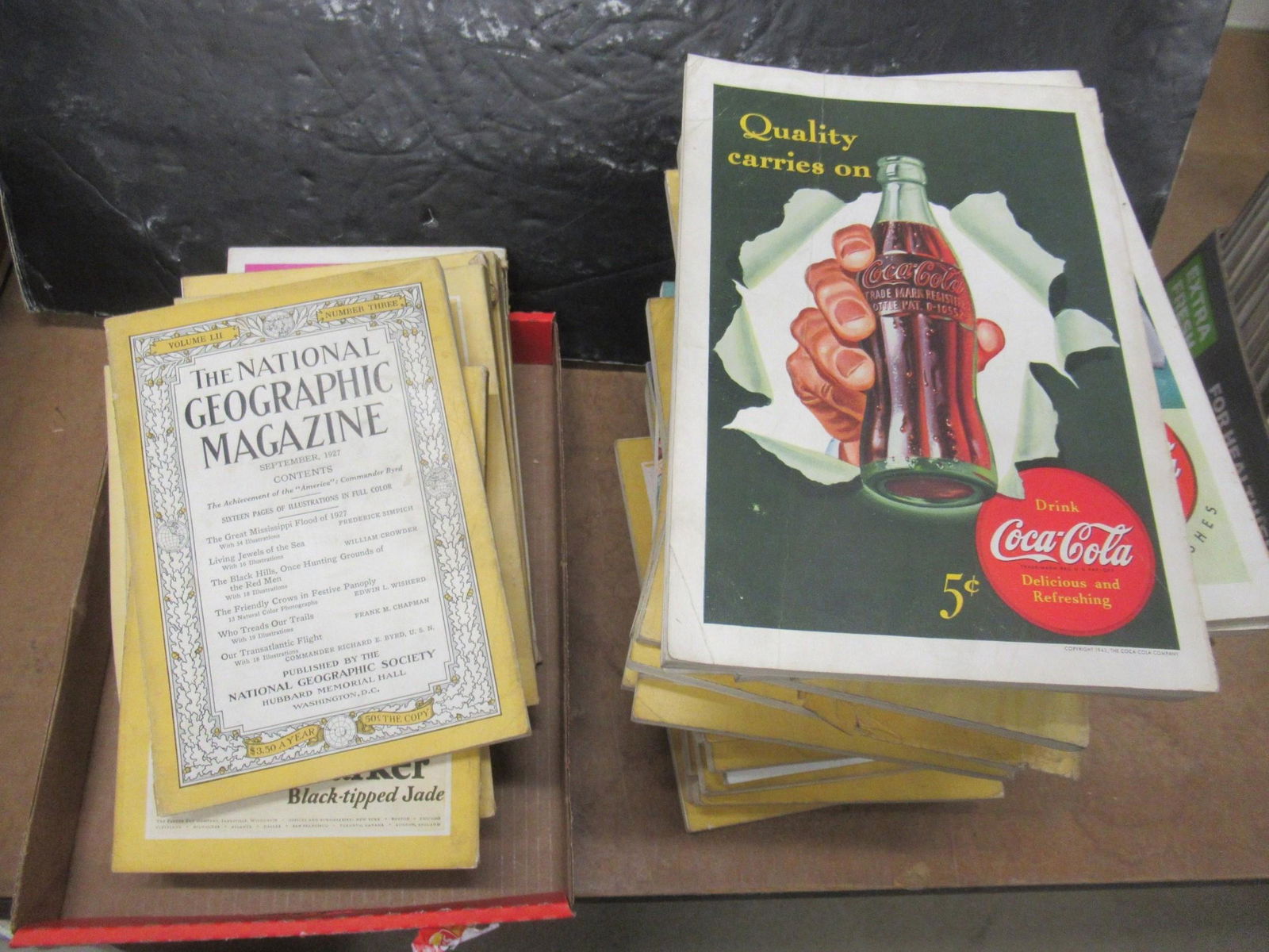 Box of National Geographics incl 1920's, 1930s: Box of National Geographics, A lot with Old Coca-Cola Advertisements on the back, Old Fountain Pen Advertisements, Etc from 1920's, 1930's, & Early 1940's -