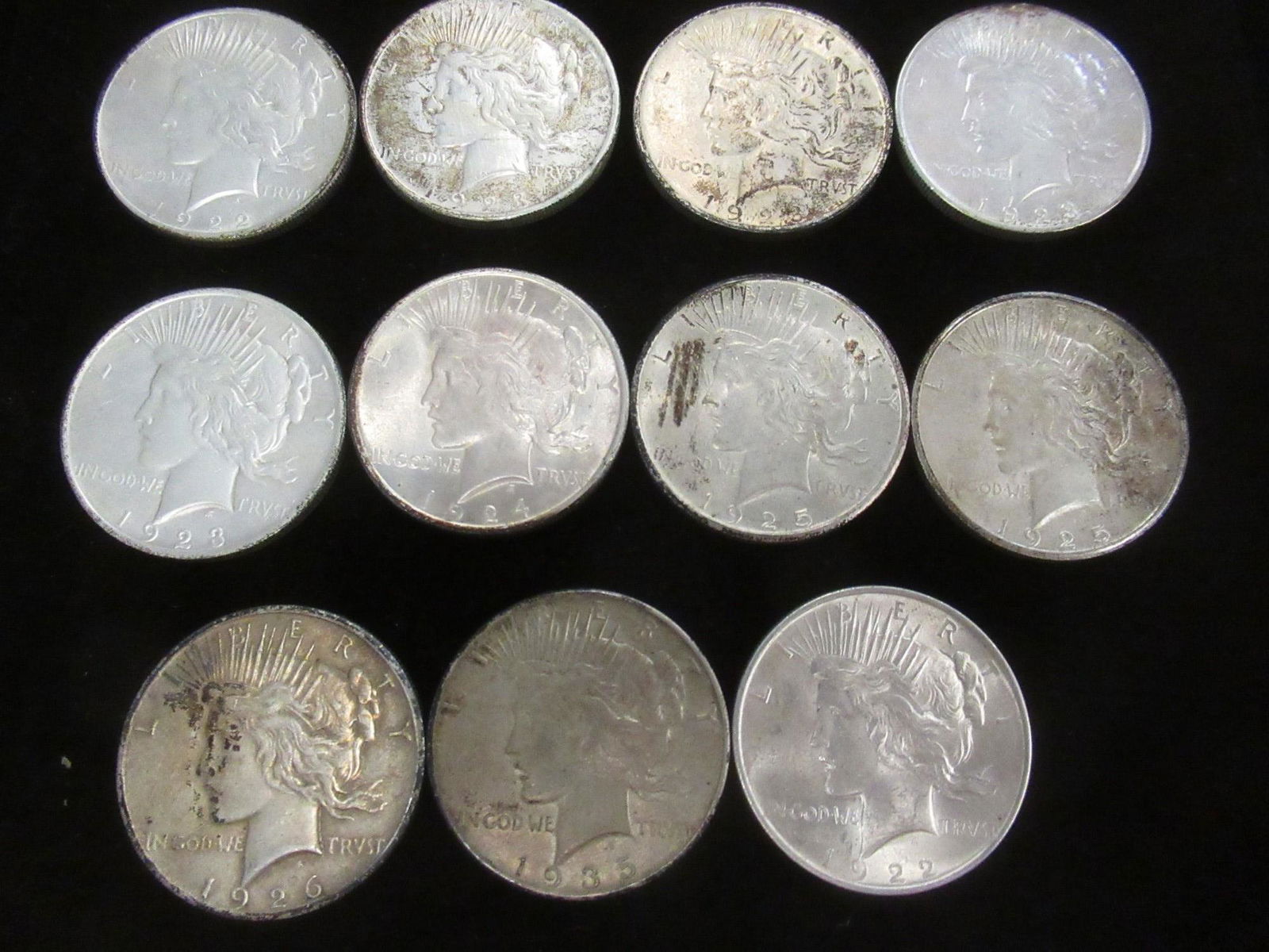 Group of 11 Peace Dollars from 1922 to 1935 (1 of 3)