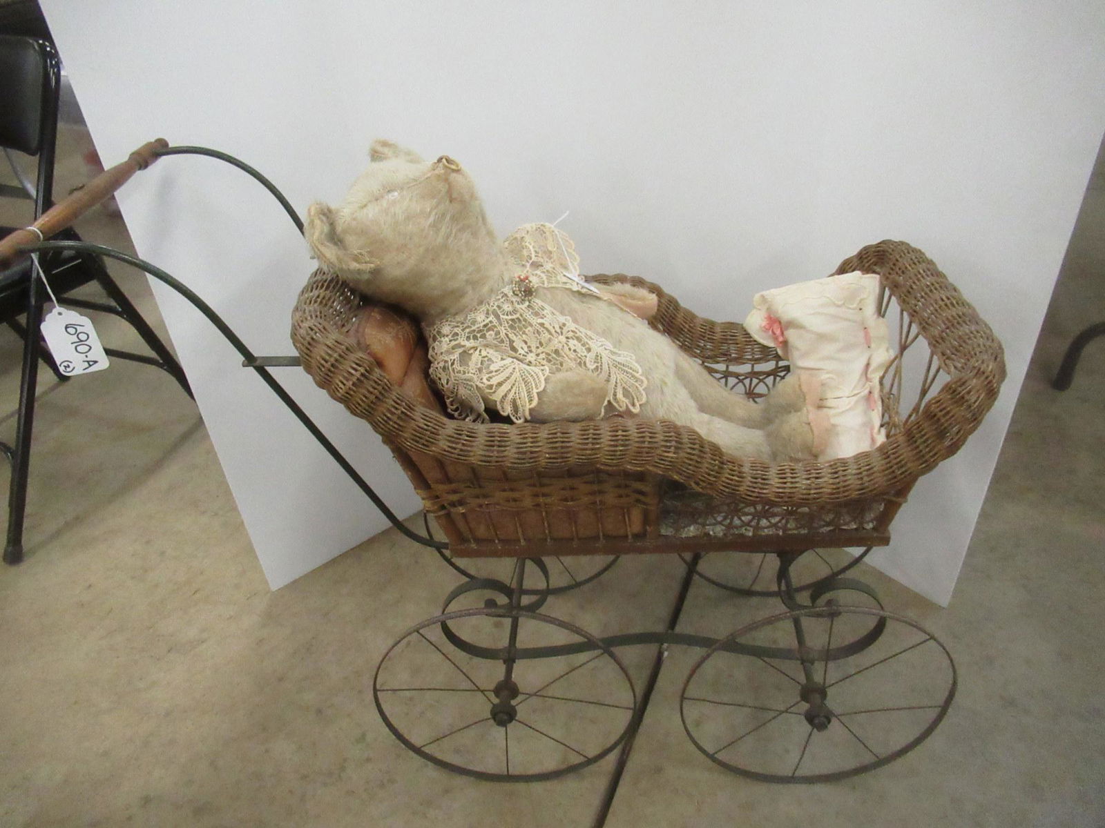 Jointed Arm White Teddy Bear & Wicker Buggy (1 of 3)