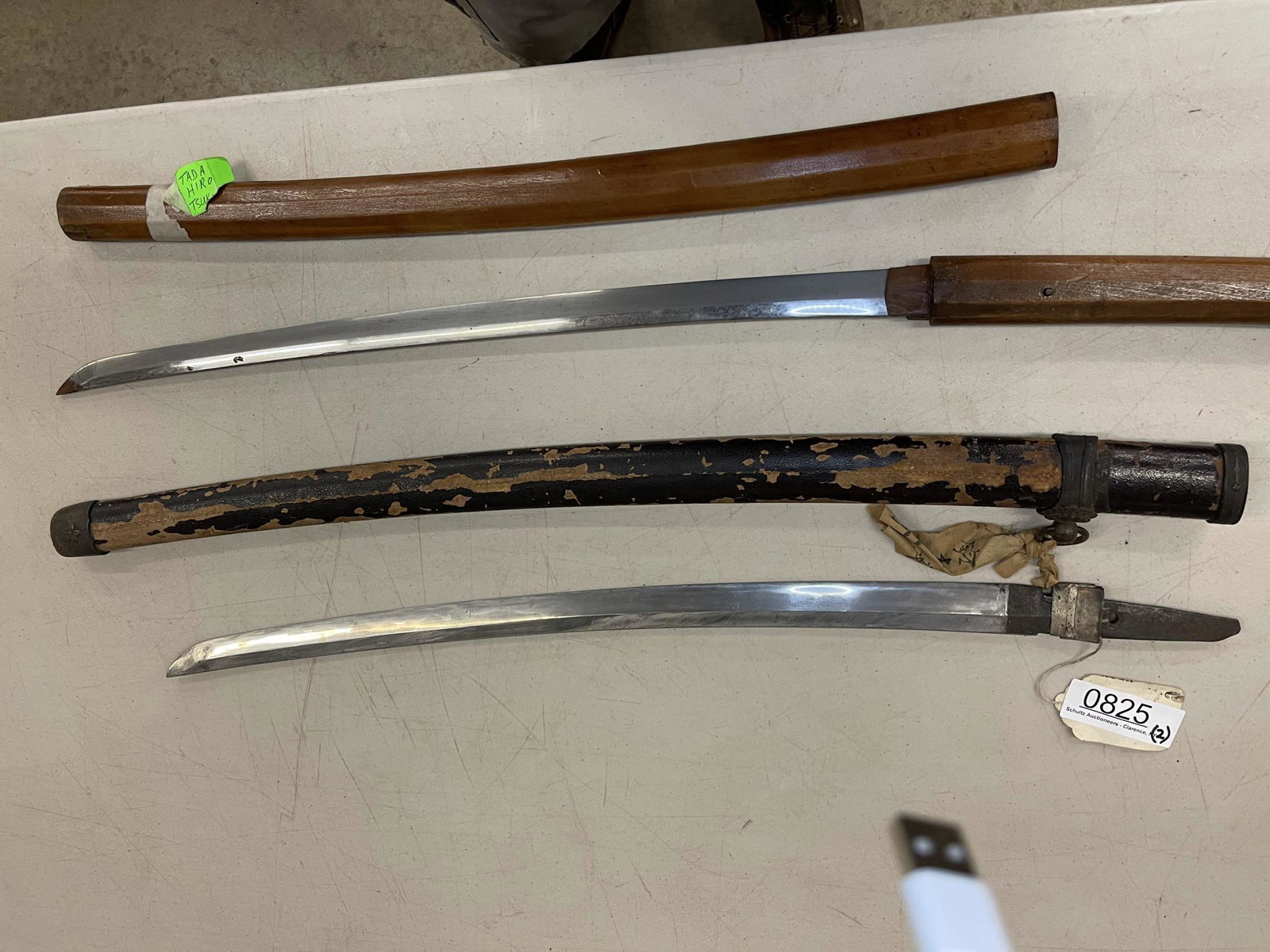 2 Japanese Swords incl. 1 with Signed Blade: 2 Japanese Swords, 1 with Wooden Handle and Scabbard with Signed Blade Marked "Tada Hiro Tsuki" and 1 with Blade Only, Unsigned with Scabbard - Signed Sword approx 32.25" long and Blade only approx 32