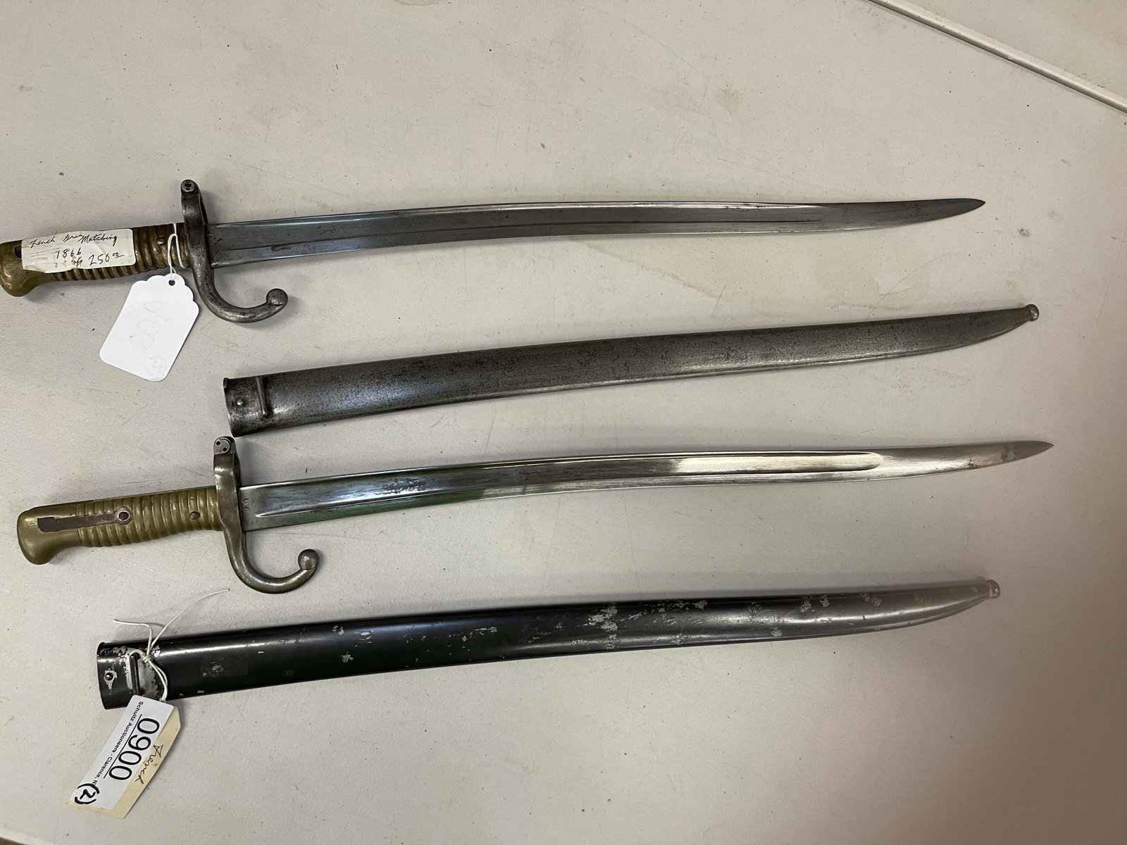 2 French Model 1866 Bayonets with Scabbards: 2 French Model 1866 Bayonets with Scabbards, both with name engraved on top of the blade - Approx 28" long