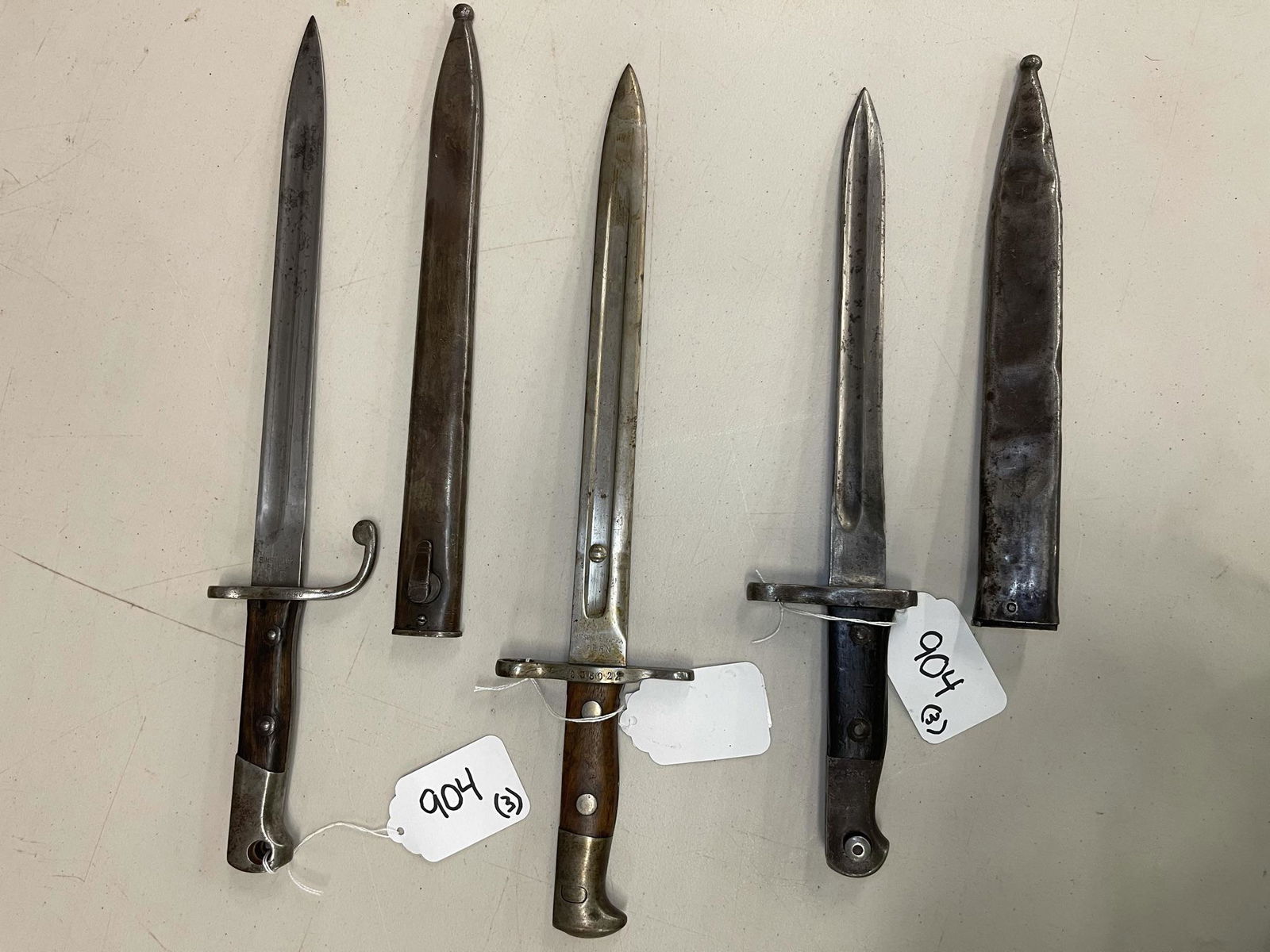 3 Bayonets, incl 1 Simson & Co. Suhl: 3 Bayonets, incl 1 Simson & Co. Suhl and 1 with Arabic Signature, and 1 Maschine En Fabrik - Longest approx 18"