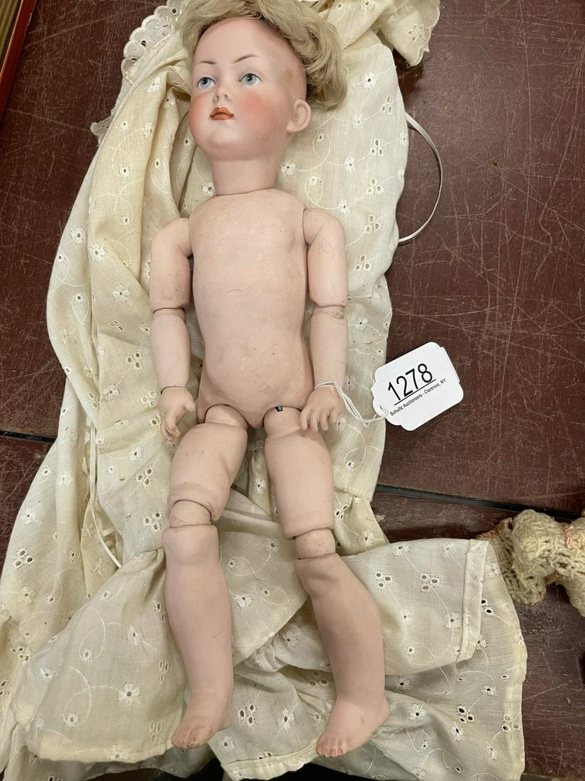 K & H Boy Bisque doll (1 of 3)