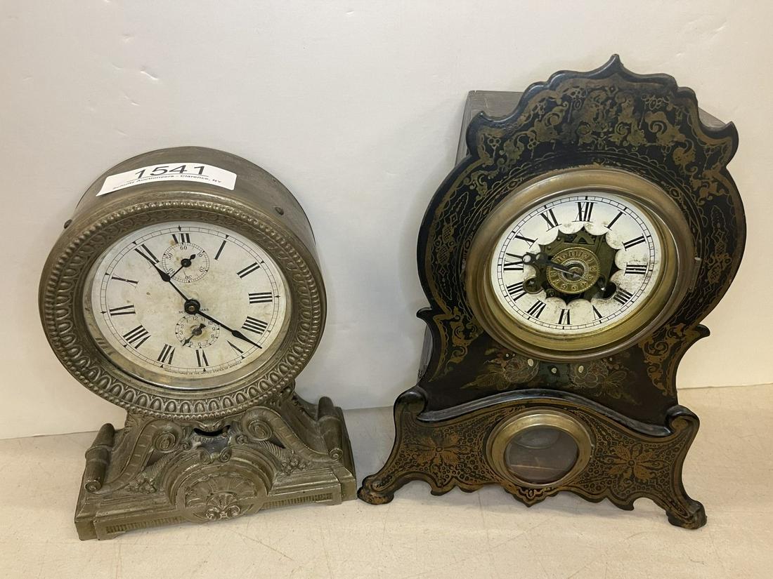 2 Clocks incl. Seth Thomas Round Clock w/ Bell: Round Metal Clock with a Bell Marked Manuf. In USA by Seth Thomas & Metal Front Decorated Clock Circa 1860s -