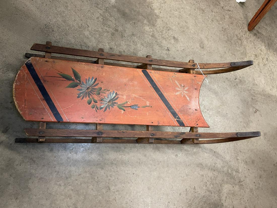 Antique Sled w/ Orange Deck & Flower Decoration: Antique Sled w/ Orange Deck, Decorated with Flowers, Metal Runners - approx 36" l x 15" w x 10" d
