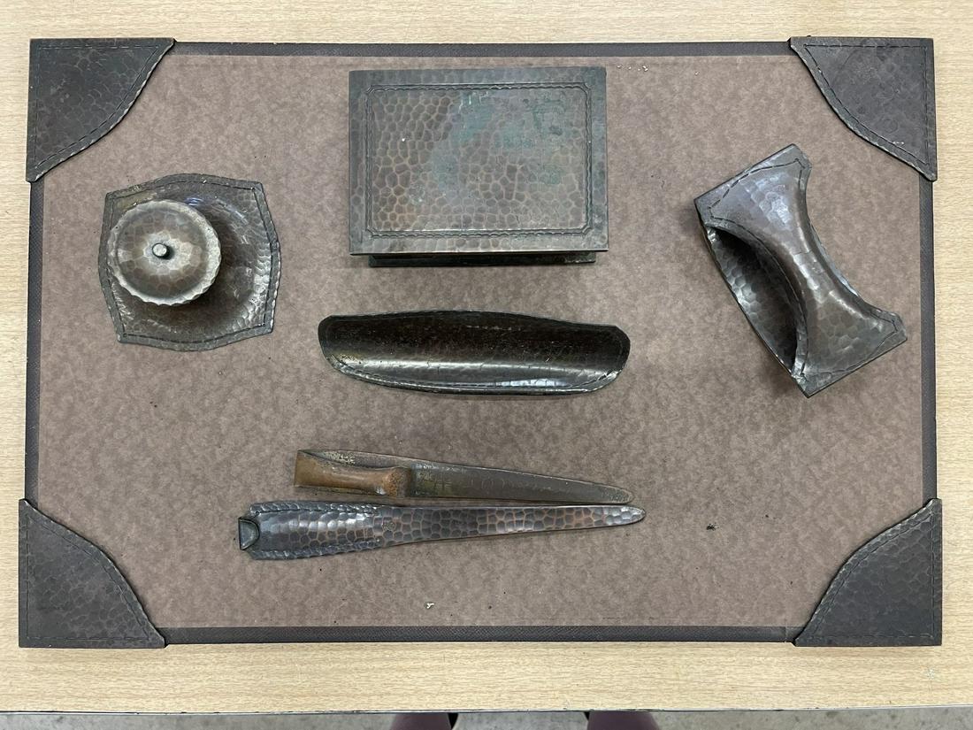 Group of Roycroft Desk Pieces: Group of Roycroft Desk Pieces incl Covered Box, inkwell, ink blotter, pen holder, letter openers, etc -