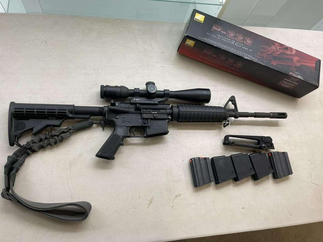 Bush Master XM15-E2S Semi-Auto Rifle #ARA038171: Bush Master Model XM15-E2S Semi-Automatic Rifle Caliber 223 w// Scope and 5 Ten Round Magazines and handle with peep sight, Serial #ARA038171, *THIS GUN CANNOT BE SOLD TO NEW YORK STATE RESIDENT UNLES