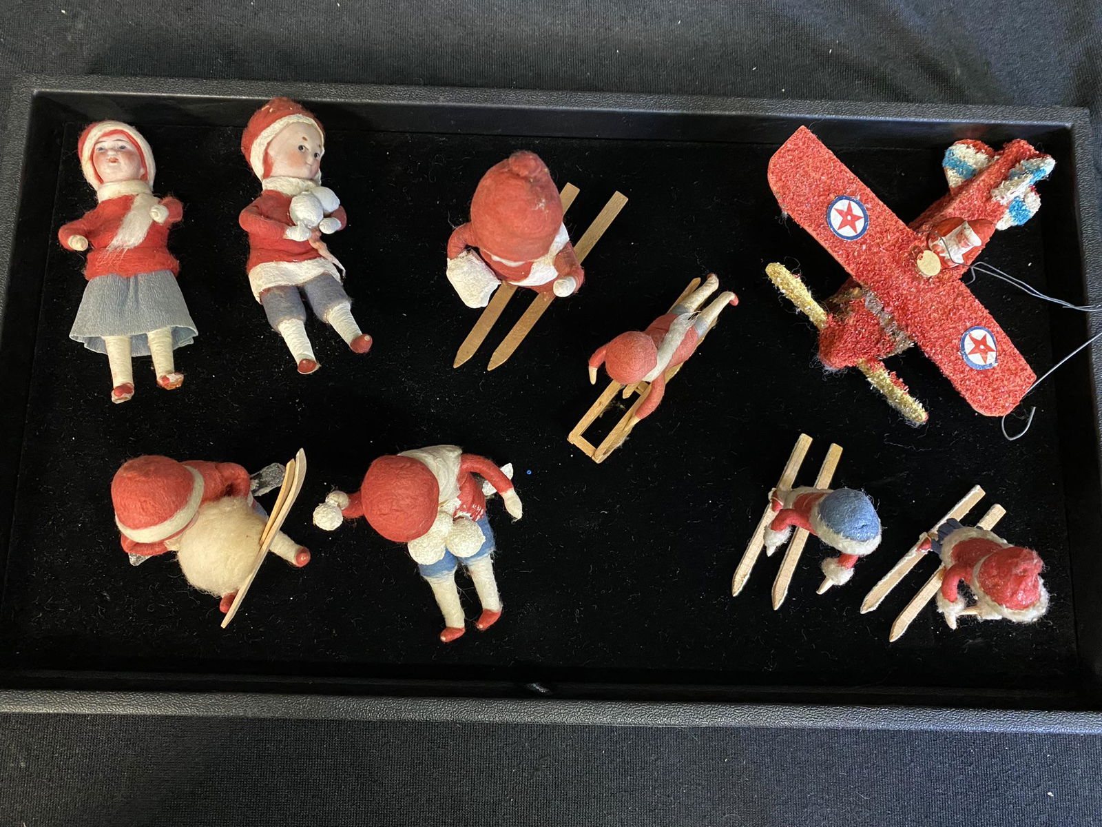 3 Spun Cotton & Bisque Head Babies etc: 3 Spun Cotton & Bisque Head Babies and Santa Claus figure in an airplane Ornaments