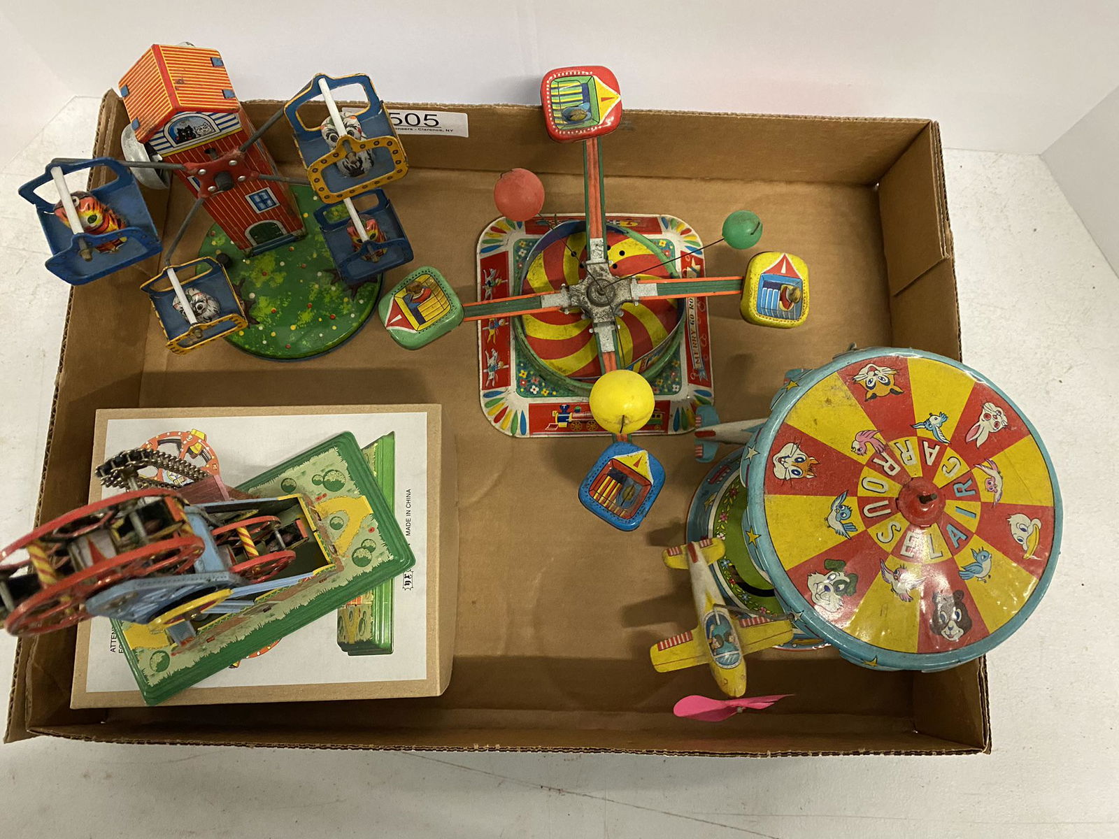 Lot of 4 Tin Wind Up Toys Lithograph: Lot of 4 Tin Wind Up Toys Lithograph, Double Ferris Wheel w/Box, Bird Ferris Wheel 8" Japan Works,Merry Go Round w/ Bell Alps japan Works, Air Carrousel ATC Japan 7" loss to propelller -