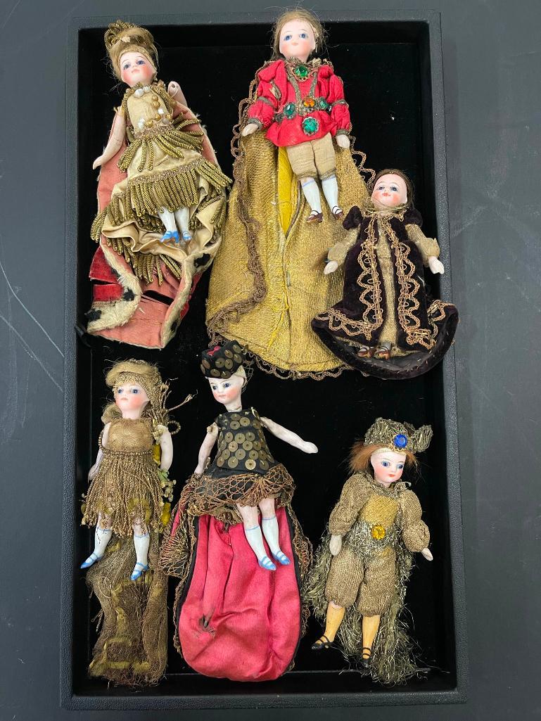6 Bisque Head Dolls, some w/ bisque bodies etc: 6 Bisque Head Dolls, some with bisque bodies, in very fancy outfits, Miniature Dolls