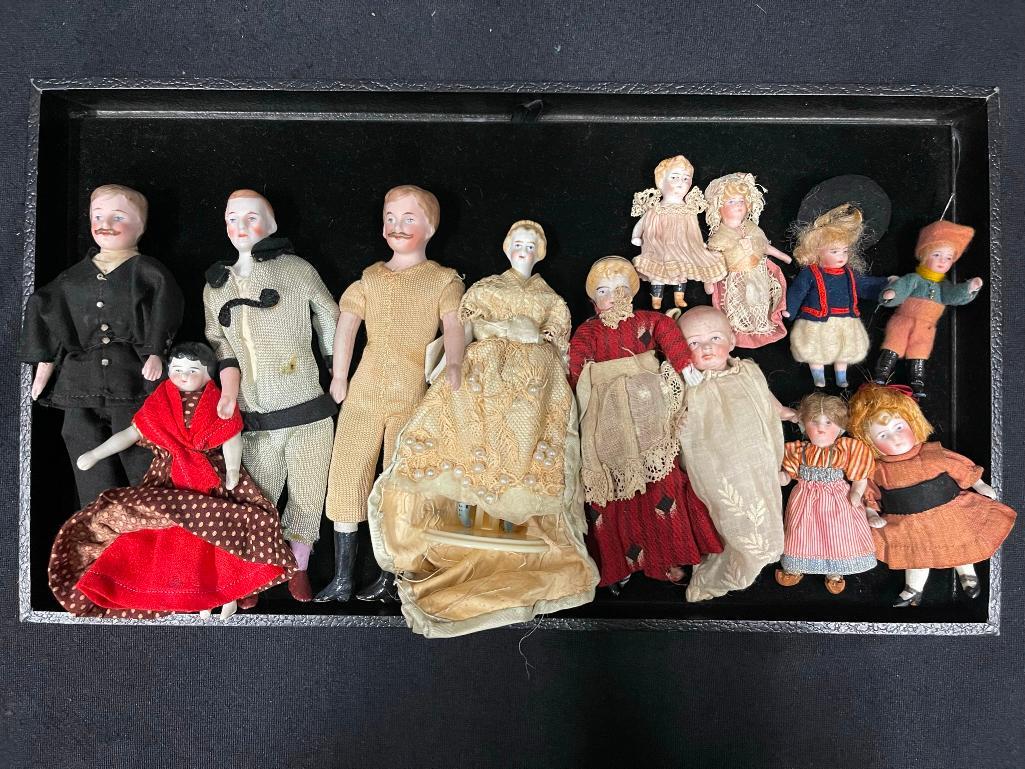 Tray Lot of Smaller Bisque & Porcelain Head Dolls: Tray Lot of Smaller Bisque & Porcelain Head Dolls, approx 13 dolls, most appear to be in original clothing