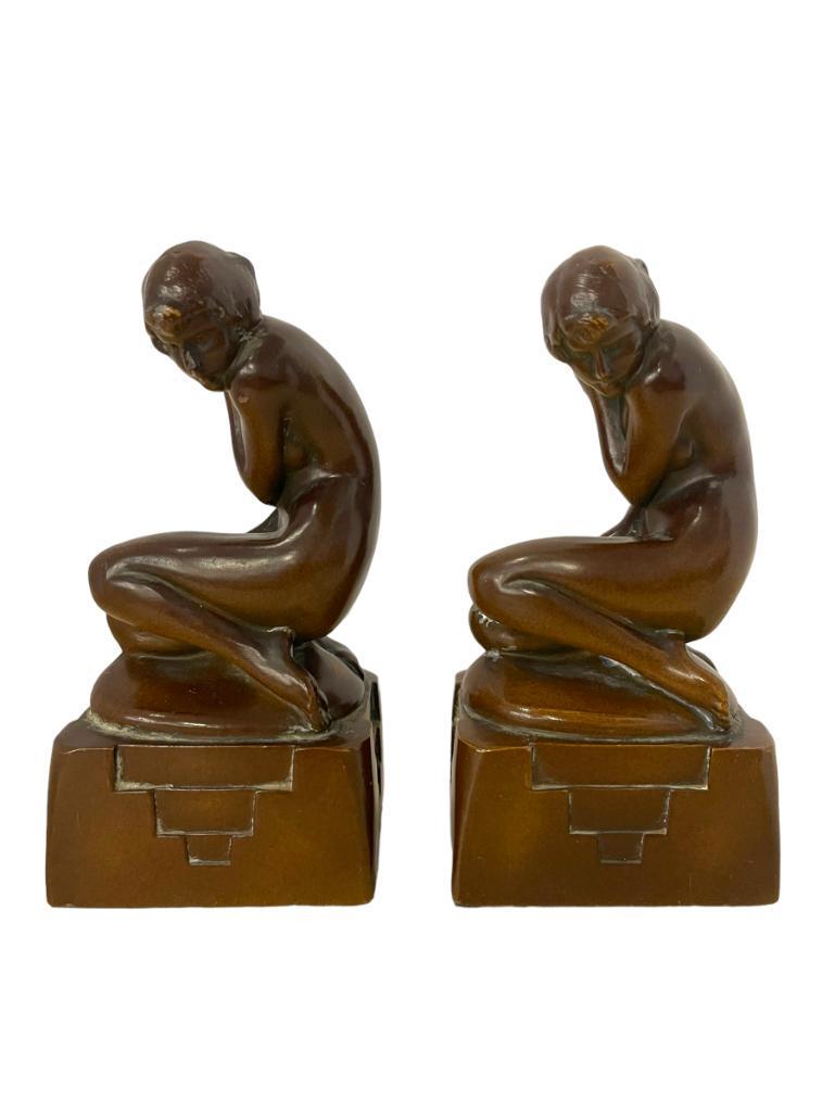 Pair Nuart Nude Female Bookends: Nuart pair of Nude Sitting Girls on Deco Skyscraper stepped bases Bookends, 7"H