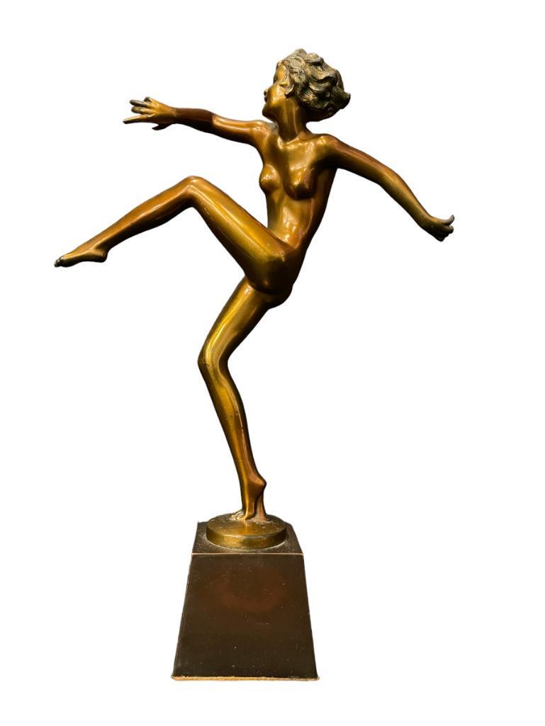 Aronson/Ronson Art Deco Female Nude Sculpture: Aronson / Ronson Art Deco female nude "Kicking Dancer" attributed to Austrian artist Josef Lorenzl and produced by Art Metal Works (Ronson) c1930-40. Height including base: 34cm/ 14", Width: 25cm/ 10"