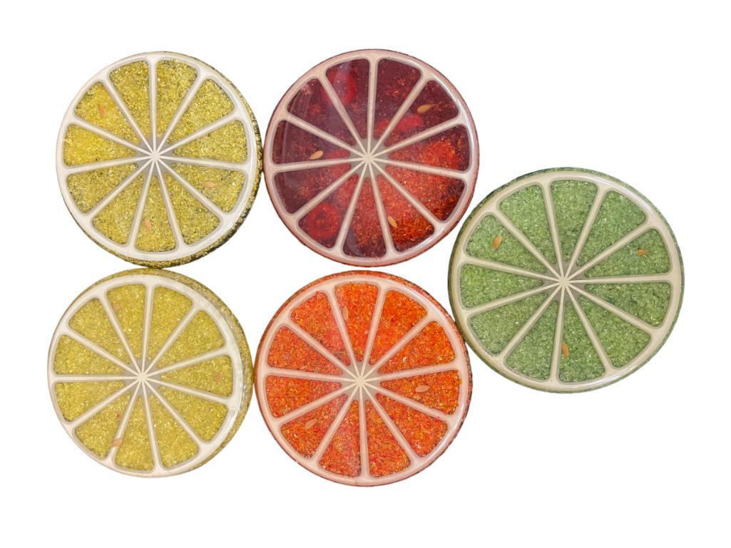 Wondermold Resin Set of 5 Trivets incl lemons, etc: Set of 5 Wondermold resin and crushed and ground glass trivets of 1-orange, 2-lemon, 1-lime, 1-blood orange w/seeds in lucite, 5.5" diam