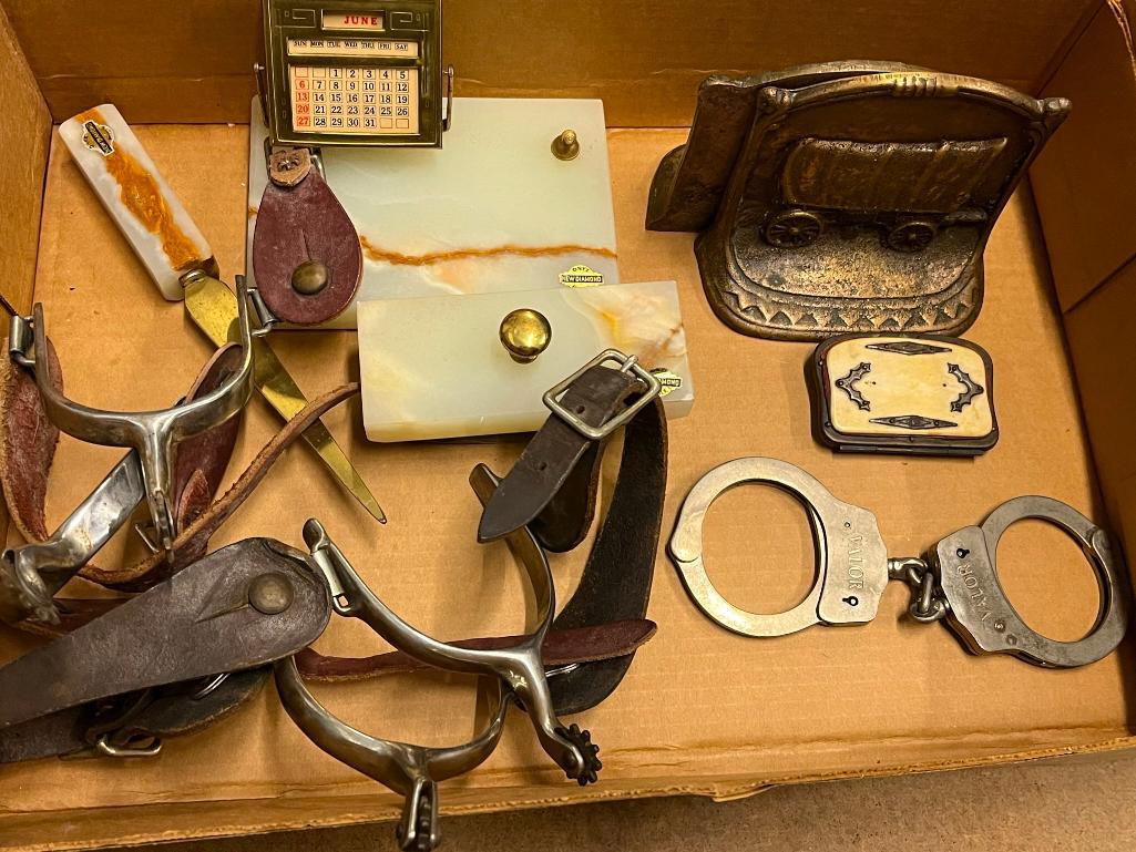 Lot incl. 2 pr. Spurs, Handmade coin purse, etc: Lot incl. 2 pr. Spurs, Handmade coin purse, brass wagon bookends, valor handcuffs