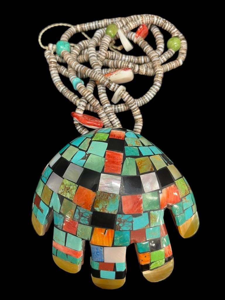 Dominzo Mosaic Shell Necklace: Dominzo shell necklace w/ mosaic applied to hand shaped shell. Approx. 4 x 4" hand.
