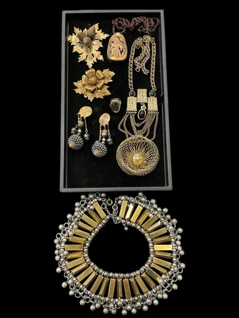 Costume Jewelry incl. YSL, etc.: Group of costume jewelry (pins & necklaces) incl. YSL, Vendome, Etro, Joseff, etc. Collection of Carole Tanenbaum.