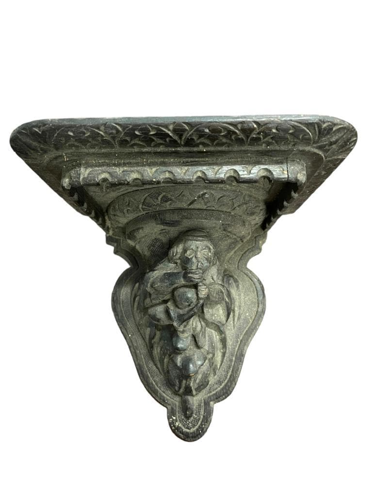 Carved Wooden Bracket w/ Shelf: Carved wooden bracket w/ carved figure holding shelf. Approx. 9.5x7.5x10H.