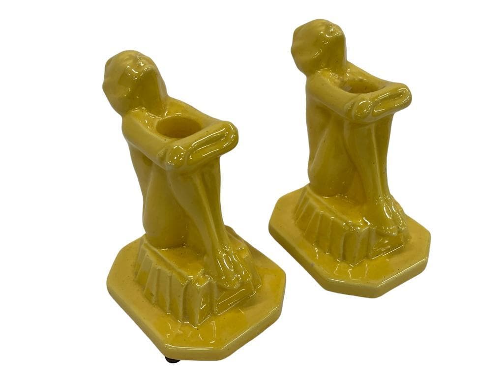 Nude Candleholders in the Style of Frankart: In the style of Frankart design, outsourced to Fulper Fayence Stangl Pottery. An art deco pair of nude candleholders, each approx. 6".