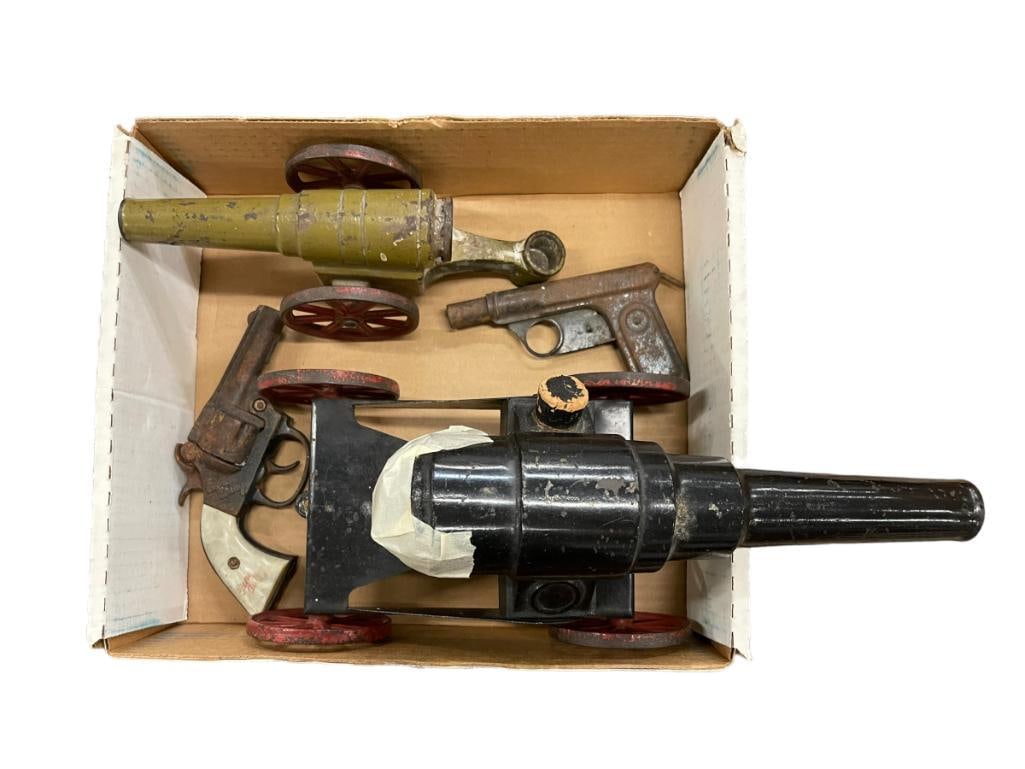 Toy Cannons & Cap Guns: Toy cannons and cap guns, approx. 5 1/2x 13x6.