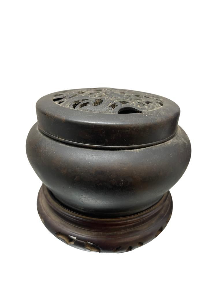 Asian Bronze Incense Burner w/Lid & Wooden Base: Asian Bronze Incense Burner with decorated lid & wooden base. Approx 4"x4"