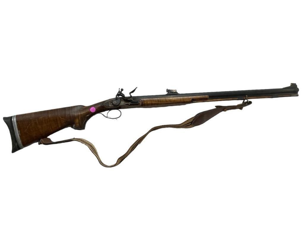 Flintlock Black Powder Rifle: Flintlock black powder rifle with tiger maple stock