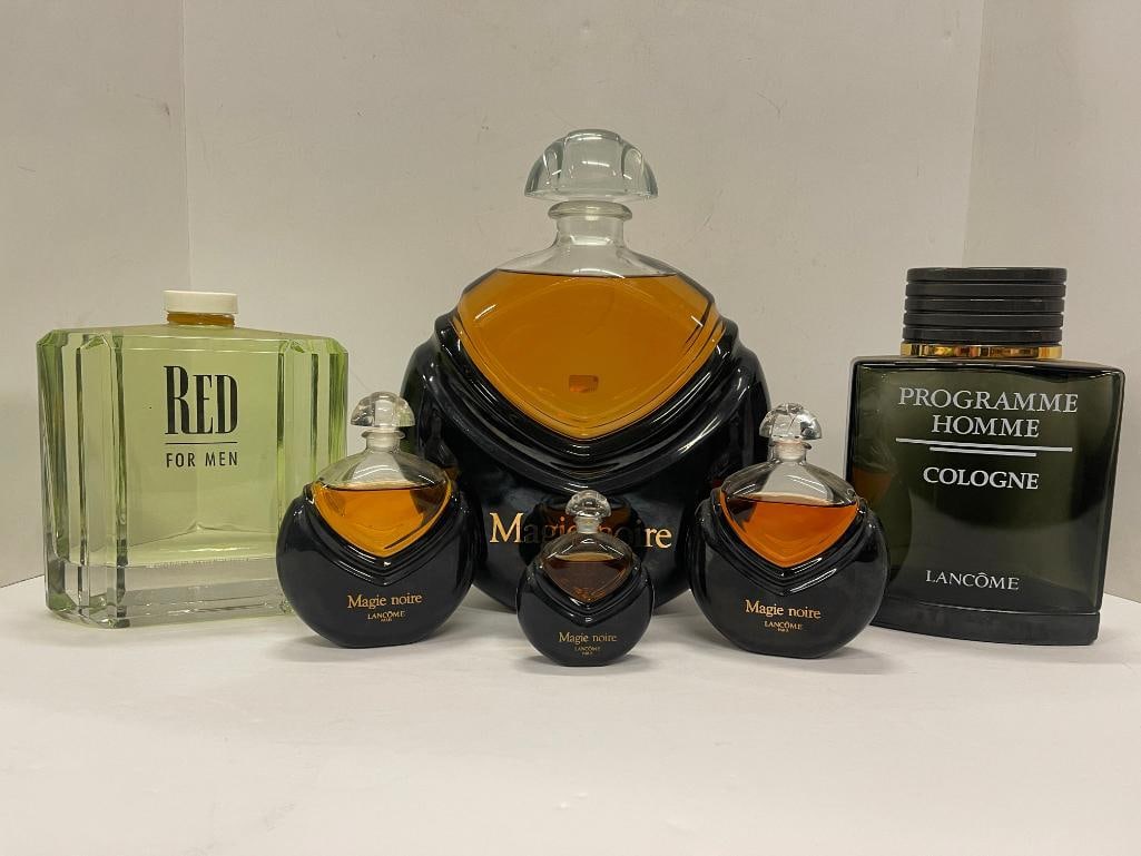 Assorted Perfume Store Display Bottles: 6 Store display bottles of perfume incl. 4 Magi Noire, 1 Lanc?me, 1 Georgio Beverly Hills.
