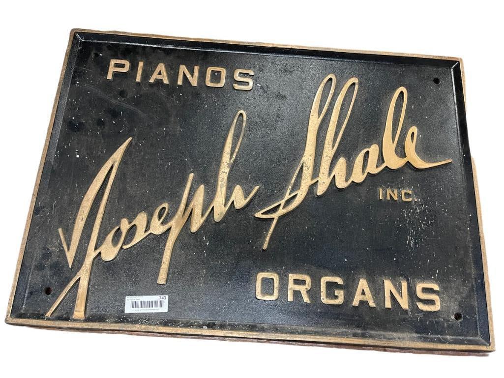 Bronze Joseph Shale INC. Pianos Organs sign: Bronze Joseph Shale INC. Pianos Organs sign. Approx 100 pounds. 30x21x1.5 in.