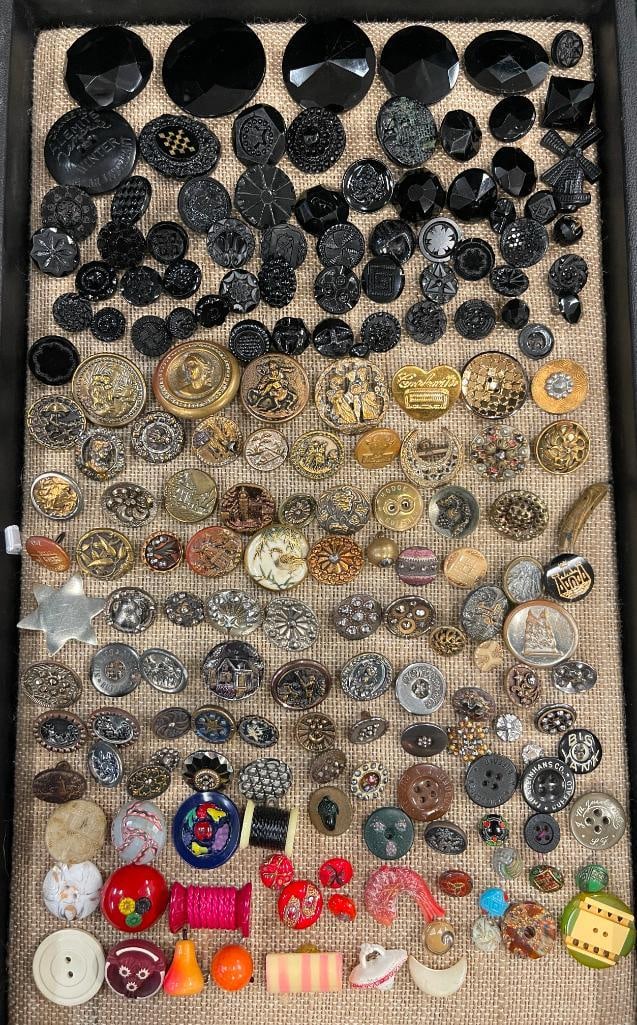 Mixed lot of buttons featuring animals, flowers, windmills, people and more: Mixed lot of buttons featuring animals, flowers, windmills, people and more. Approx.150 pieces. 1x1x1 in. Provenance: Deaccession from Clarence Historical Society