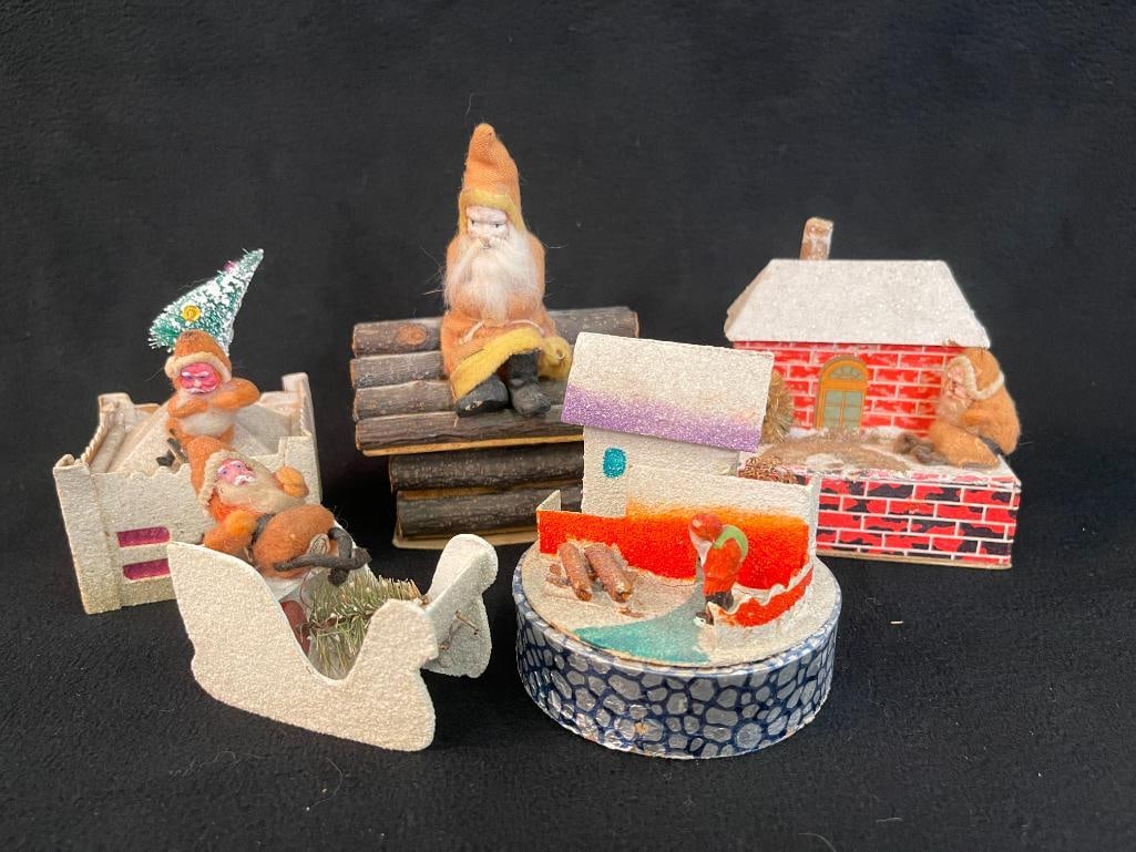 Group of 5 antique Santa figurines and candy containers with houses and more: Group of 5 Antique Santa figurines and candy containers with houses and more. Some marked Germany. 5 pieces. 5x6x4 in.