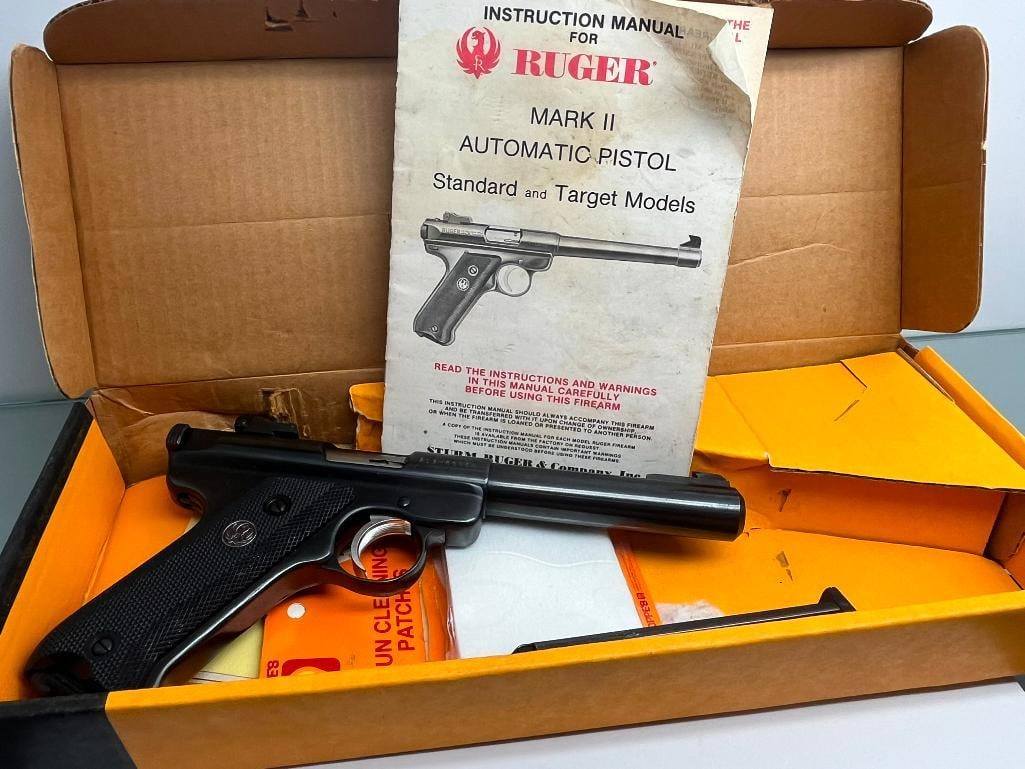 Ruger Mark 2 semi-auto target pistol .22 long rifle: Ruger Mark 2 semi-auto target pistol .22 long rifle. Serial #21289358. 5.5 inch barrel. Comes with original box, book and extra magazine.