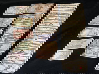 Group of U.S. $2 bills and foreign currency
