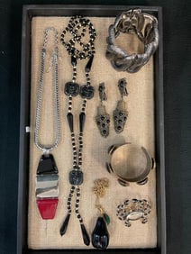 Group of costume jewelry, earrings, necklaces and more