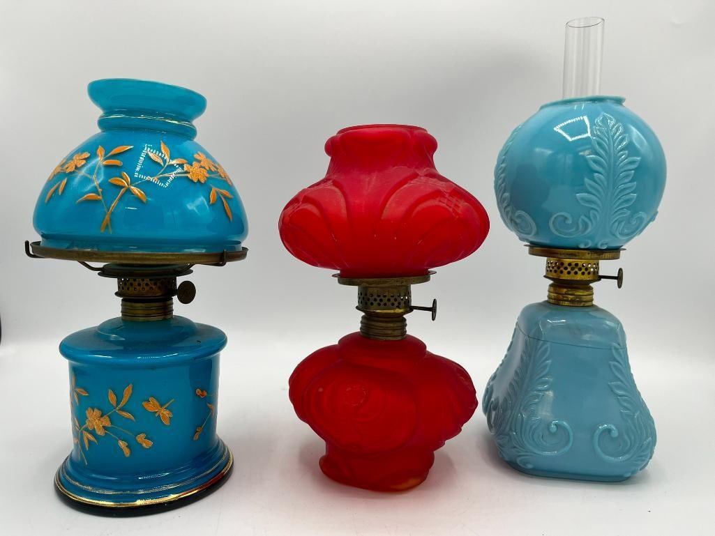 Group of 3 small oil lamps, one A.M. Zimbrich Rochester NY: Group of 3 small oil lamps, one A.M. Zimbrich Rochester NY. Lamps have damage/repairs. 3 pieces. Approx. 11x4x4 inches.