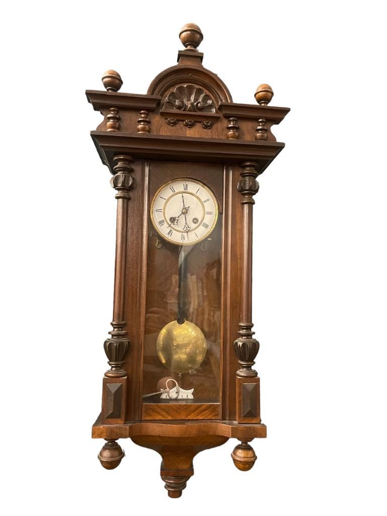 Vienna wall clock: Vienna wall clock. Approx. 38x13x6 inches.