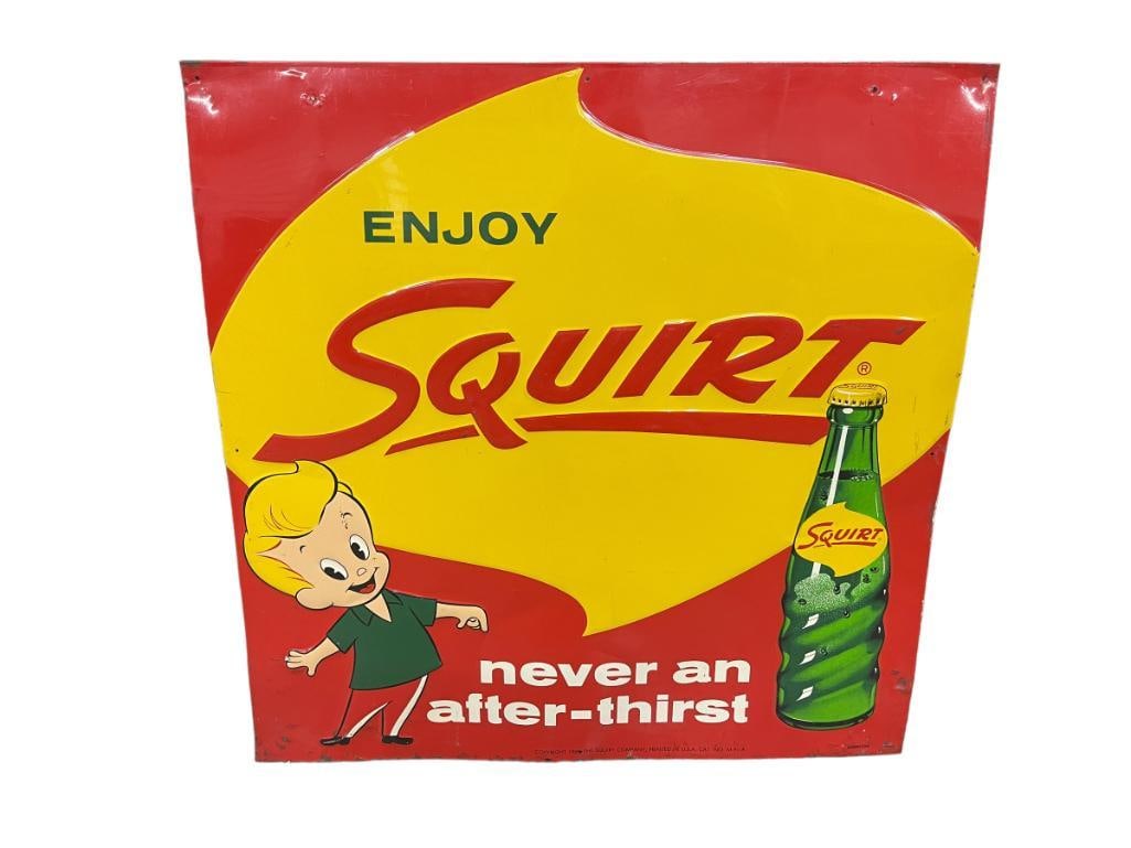1959 embossed metal Squirt advertising sign: 1959 embossed metal Squirt advertising sign. Approx. 27x27 inches.